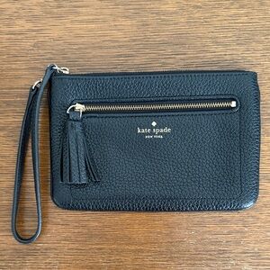 kate spade black pebbled leather wristlet with tassel charm